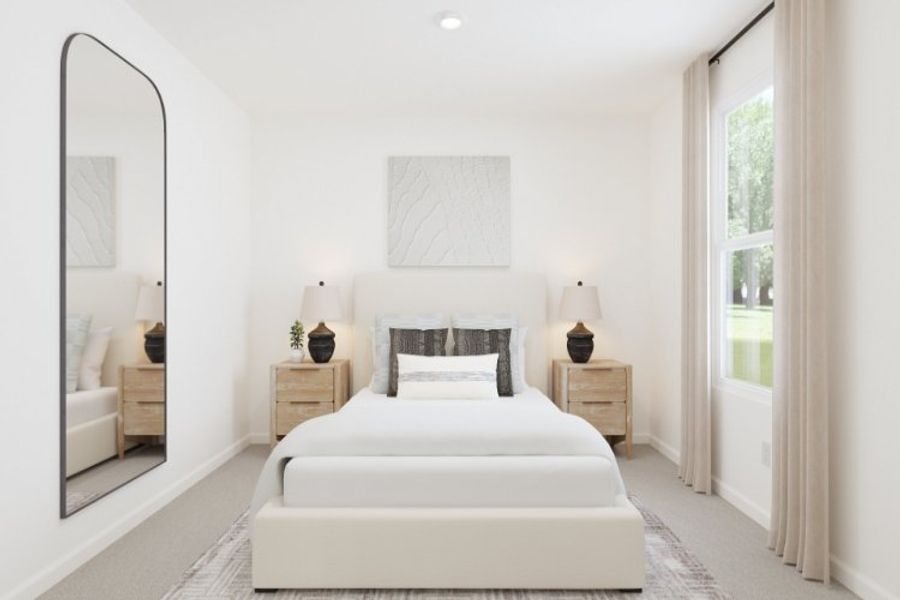 A bedroom with a white bed and white walls. A bedroom with a white bed and white walls.