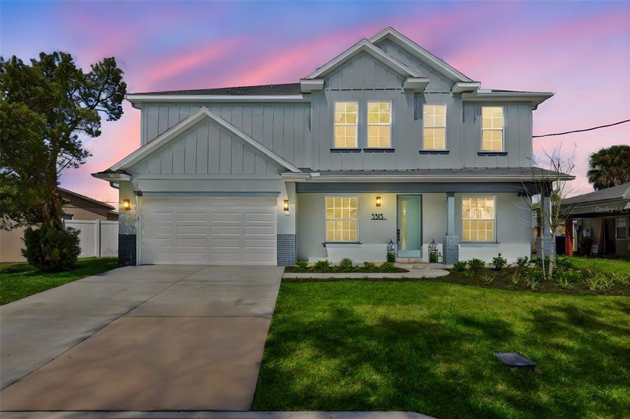 Front exterior of a new home in , Tampa, FL, highlighting curb appeal (Image 26).
