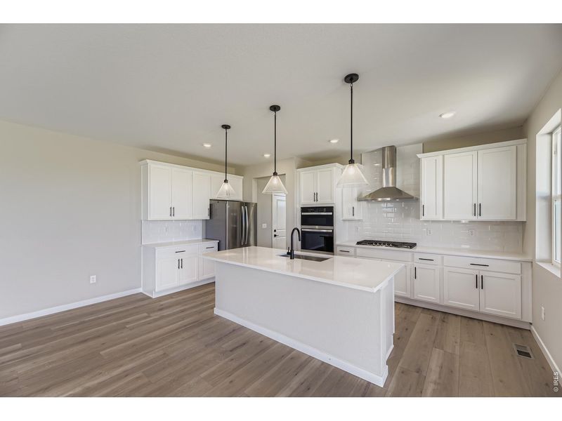 Furnished interior view inside a new home in Farmstead, Berthoud (Image 4).