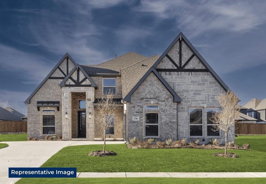 Front exterior of a new home in Birdsong, Mansfield, TX, highlighting curb appeal (Image 24). Front exterior of a new home in Birdsong, Mansfield, TX, highlighting curb appeal (Image 24).