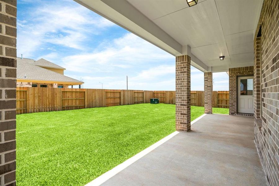 Large cover patio. Sample photo of completed home with similar floor plan. As-built interior colors and selections may vary.