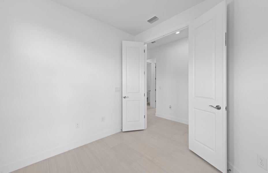 Enclosed flex room featuring French doors Enclosed flex room featuring French doors