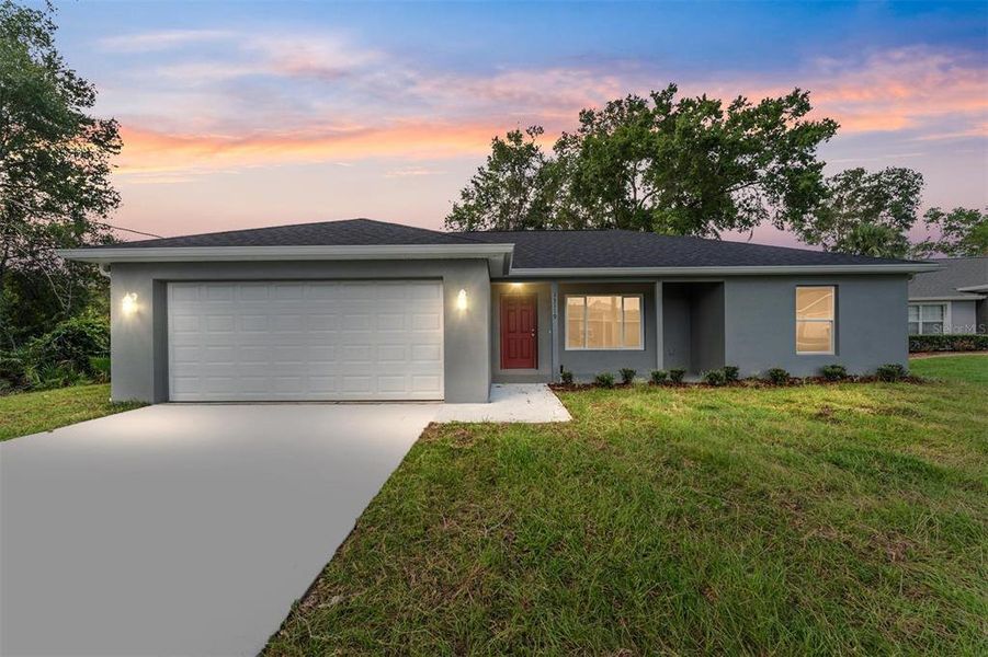 Front exterior of a new home in , Dunnellon, FL, highlighting curb appeal (Image 29).