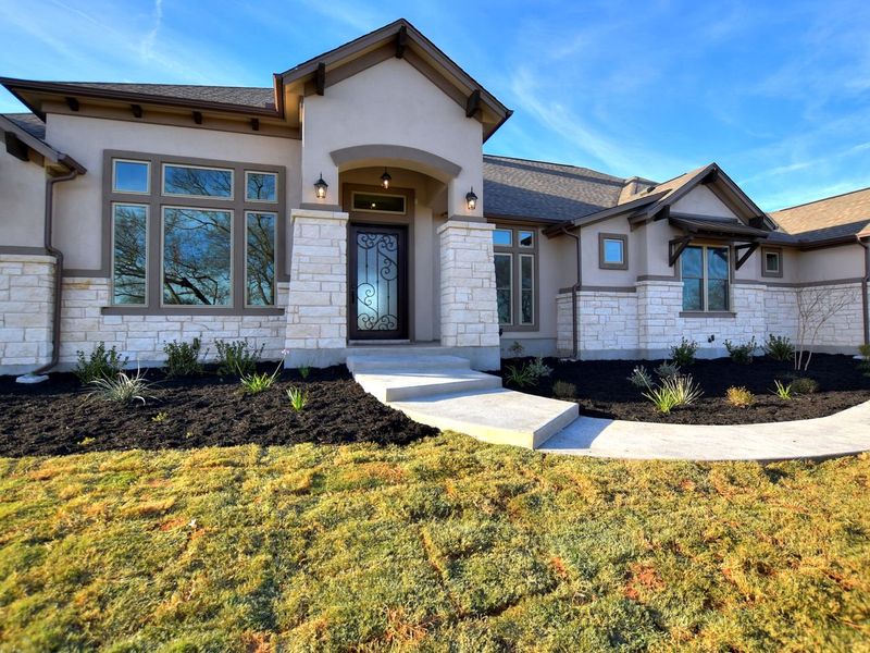 Representative exterior photo of a completed home built from the Coronado I by Giddens Homes in Clearwater Ranch, Liberty Hill, TX (Image 37).