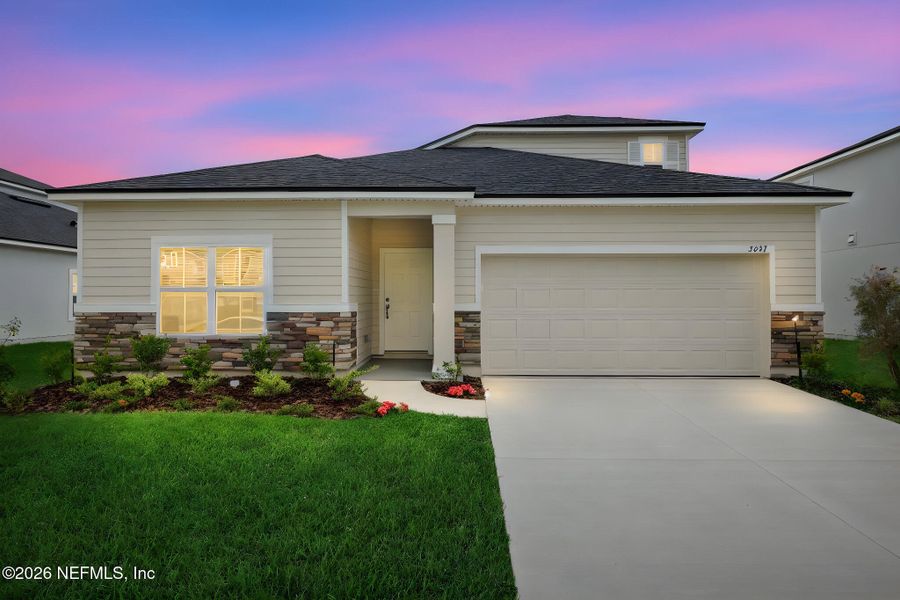 Front exterior of a new home in Wilford Oaks, Orange Park, FL, highlighting curb appeal (Image 22).