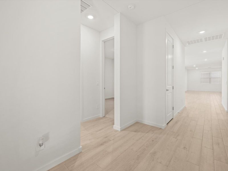 Spacious, unfurnished interior of a new home in Mountain View Estates Signature Series, Buckeye (Image 12).