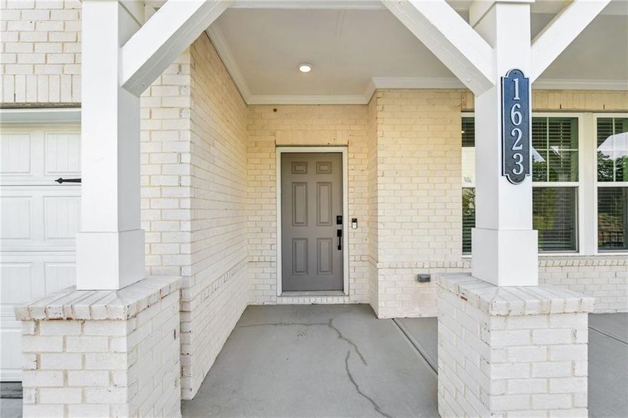 Exterior details and patio area of a home in Auburn Glen, Dacula (Image 27).