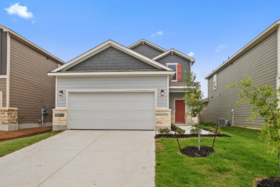 Front exterior of a new home in Hacienda, San Antonio, TX, highlighting curb appeal (Image 2). Front exterior of a new home in Hacienda, San Antonio, TX, highlighting curb appeal (Image 2).