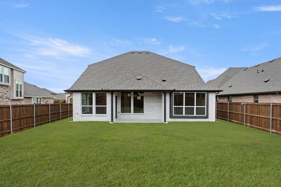 Exterior details and patio area of a home in Silo Mills - Select Series, Joshua (Image 4).