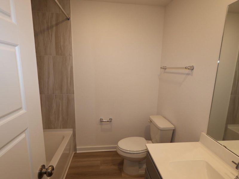 Furnished interior view inside a new home in Pinewood at Grand Texas, New Caney (Image 2). Furnished interior view inside a new home in Pinewood at Grand Texas, New Caney (Image 2).