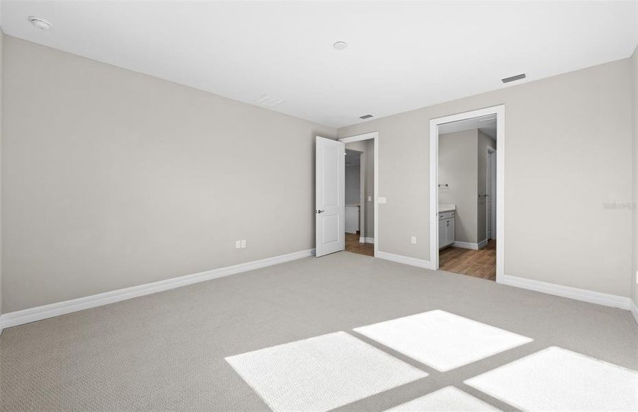 Spacious, unfurnished interior of a new home in Cedar Grove at The Woodlands, North Port (Image 17).