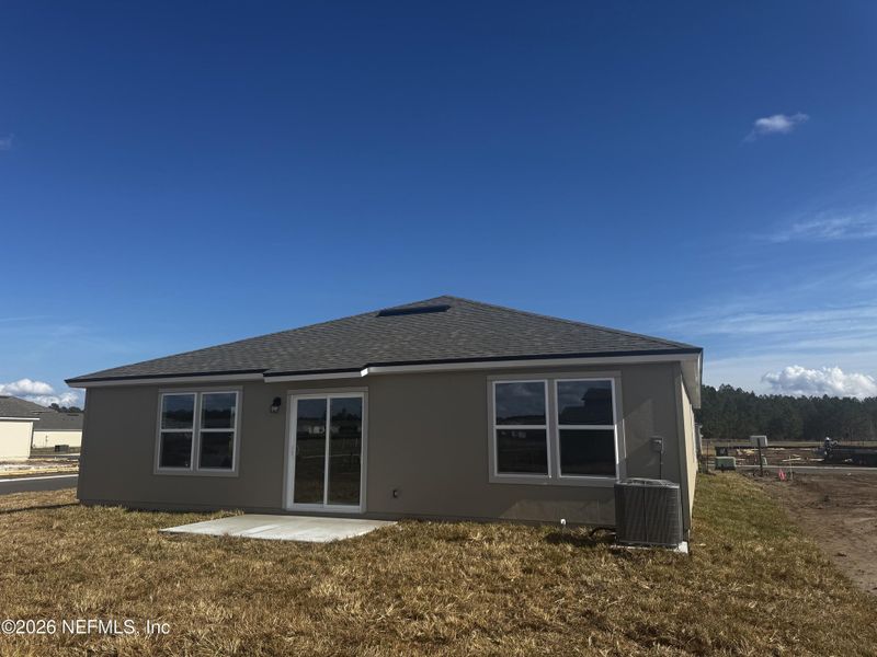 Exterior details and patio area of a home in The Arbors, Jacksonville (Image 28).