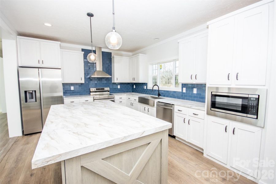 Furnished interior view inside a new home in , Hamptonville (Image 9).