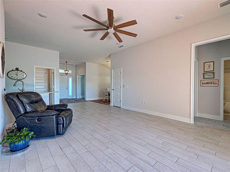 Spacious, unfurnished interior of a new home in Watercress Cove, North Port (Image 35).