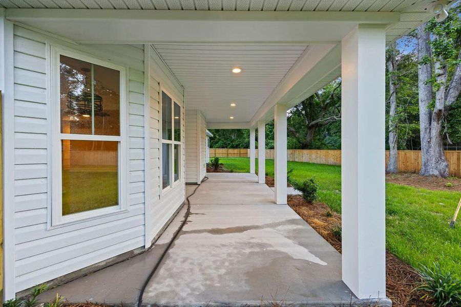 Exterior details and patio area of a home in , Awendaw (Image 33).