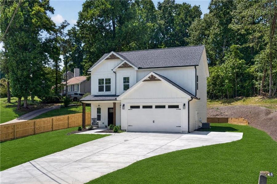 Front exterior of a new home in , Cumming, GA, highlighting curb appeal (Image 31).