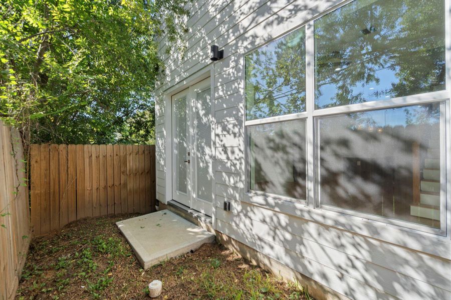 Exterior details and patio area of a home in , Houston (Image 2). Exterior details and patio area of a home in , Houston (Image 2).