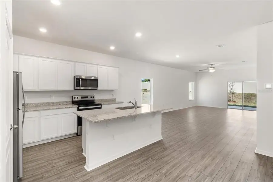 Furnished interior view inside a new home in Peach Crossings, Winter Haven (Image 4).