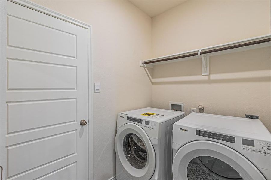 Laundry room featuring washer and dryer