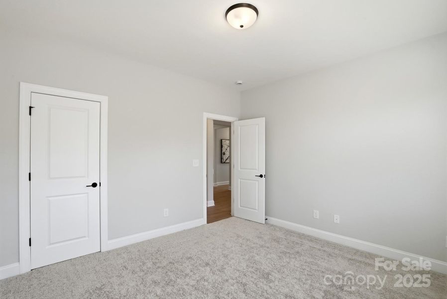 Spacious, unfurnished interior of a new home in Carrington, Stanley (Image 24).