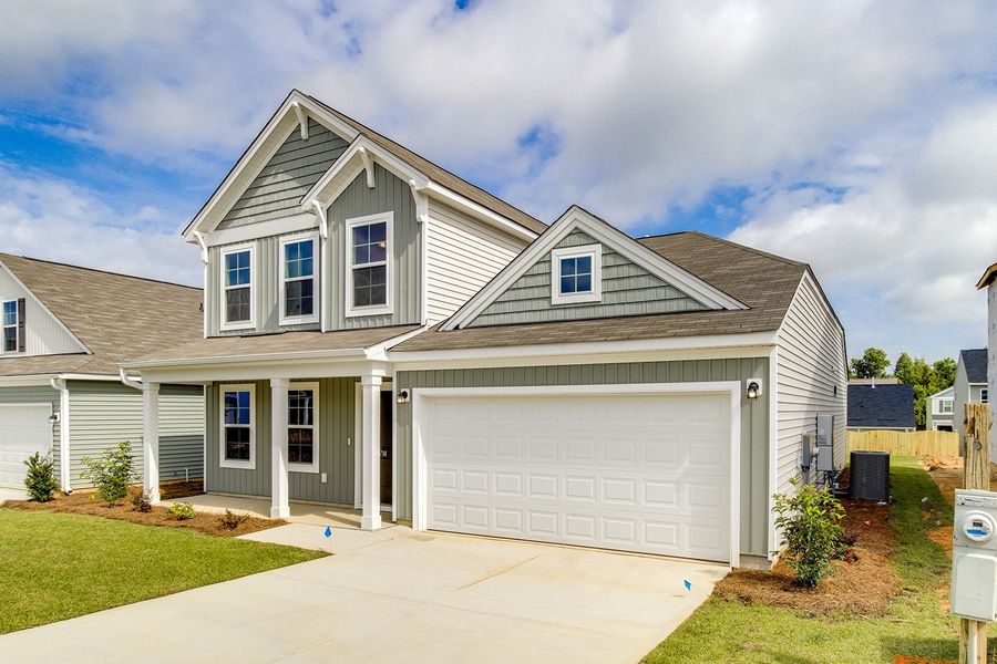 Front exterior of a new home in Winston Point, Gilbert, SC, highlighting curb appeal (Image 2).