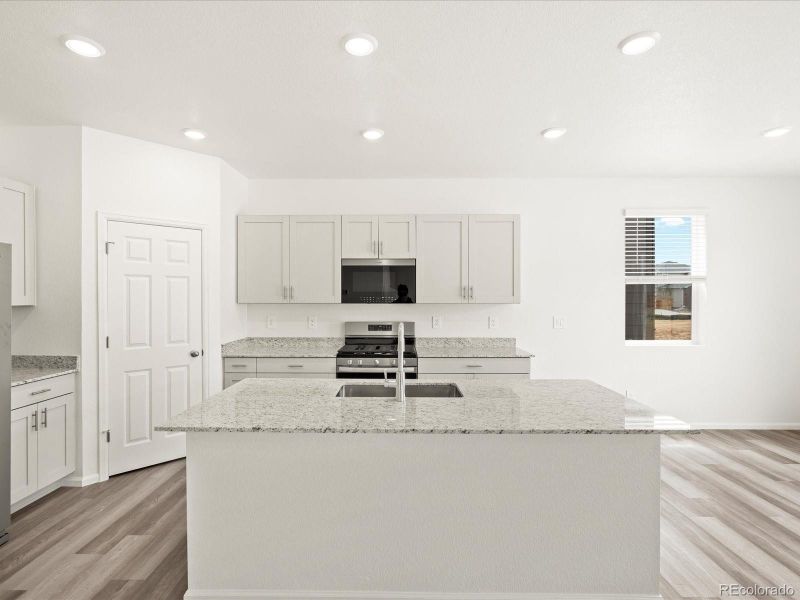 Furnished interior view inside a new home in Ridgeline Vista: The Flora Collection, Brighton (Image 10).