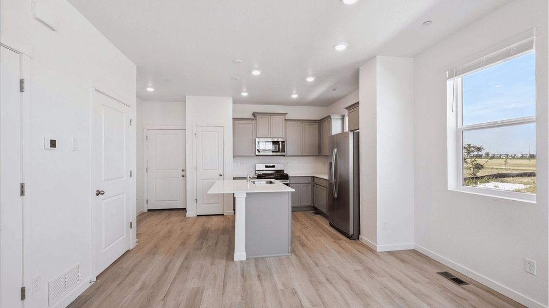 Furnished interior view inside a new home in Settlers Crossing, Commerce City (Image 10).