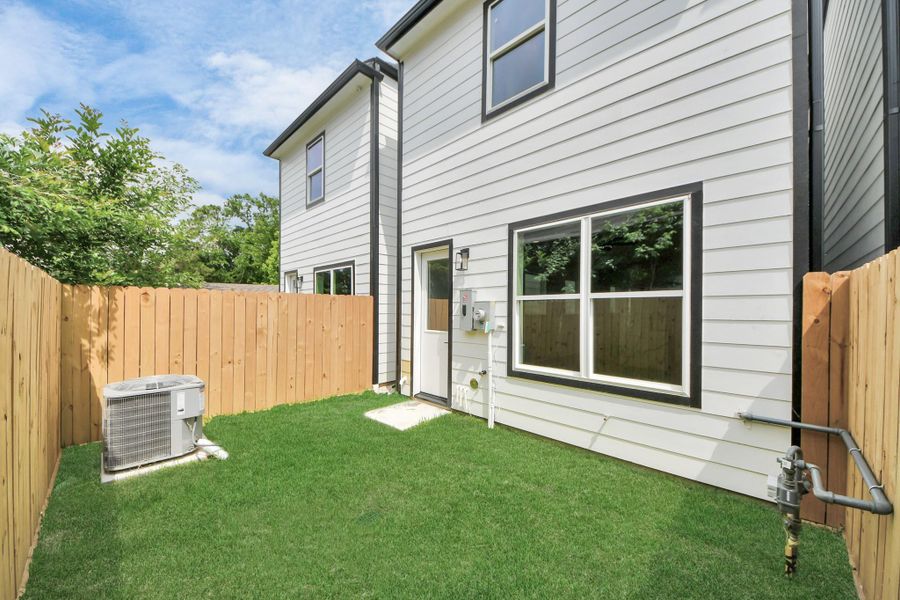 Exterior details and patio area of a home in , Houston (Image 3).