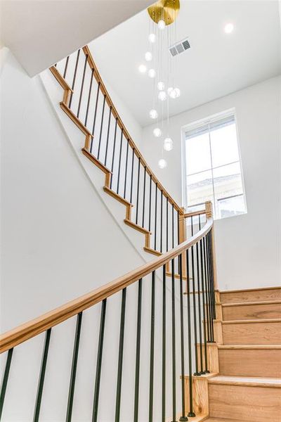 Stairway featuring recessed lighting Stairway featuring recessed lighting