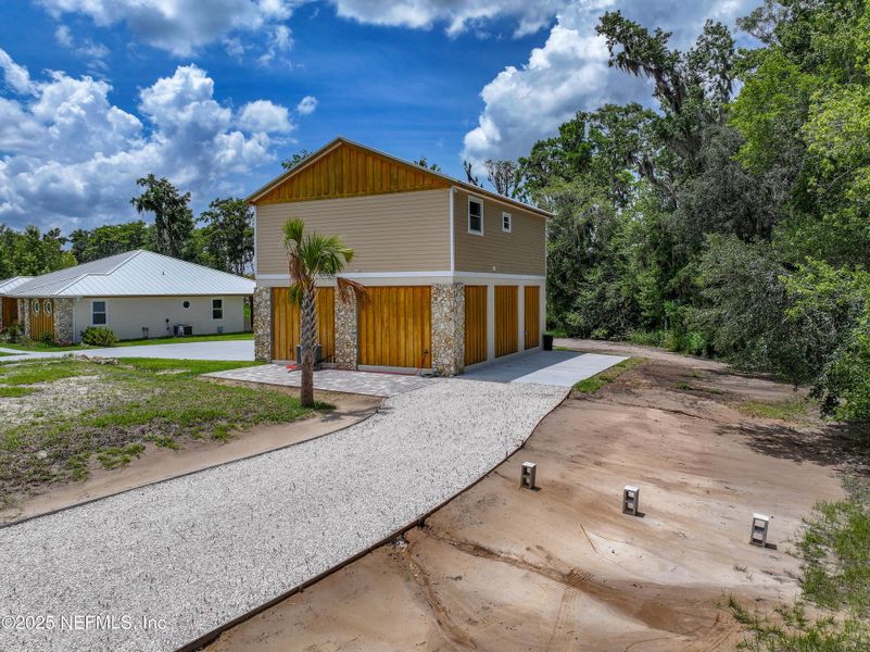 Front exterior of a new home in , East Palatka, FL, highlighting curb appeal (Image 38). Front exterior of a new home in , East Palatka, FL, highlighting curb appeal (Image 38).