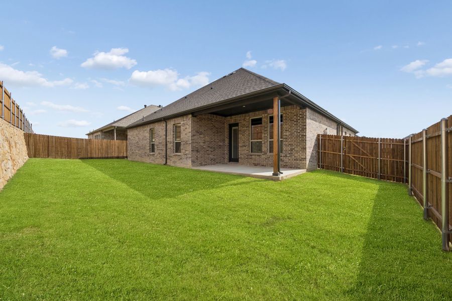 Exterior details and patio area of a home in Country Lakes, Denton (Image 4). Exterior details and patio area of a home in Country Lakes, Denton (Image 4).