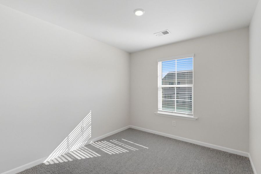 Representative unfurnished interior of a home built from the Palmetto II by McGuinn Homes in Clarke Townes, Anderson (Image 63).