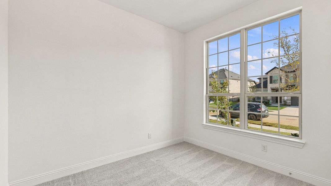 Furnished interior view inside a new home in Green Meadows Classic, Celina (Image 14).