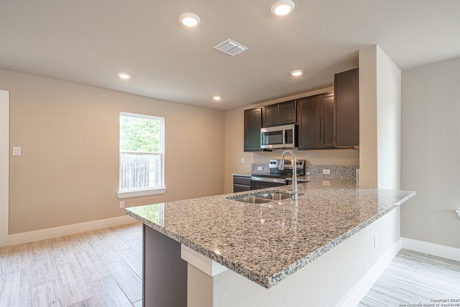 Furnished interior view inside a new home in , Seguin (Image 8). Furnished interior view inside a new home in , Seguin (Image 8).