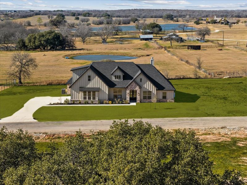 Front exterior of a new home in Brock Heights, Brock, TX, highlighting curb appeal (Image 34).