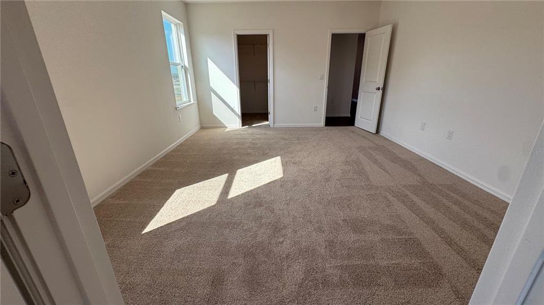 Spacious, unfurnished interior of a new home in Applewood Reserve, Lakeland (Image 22).