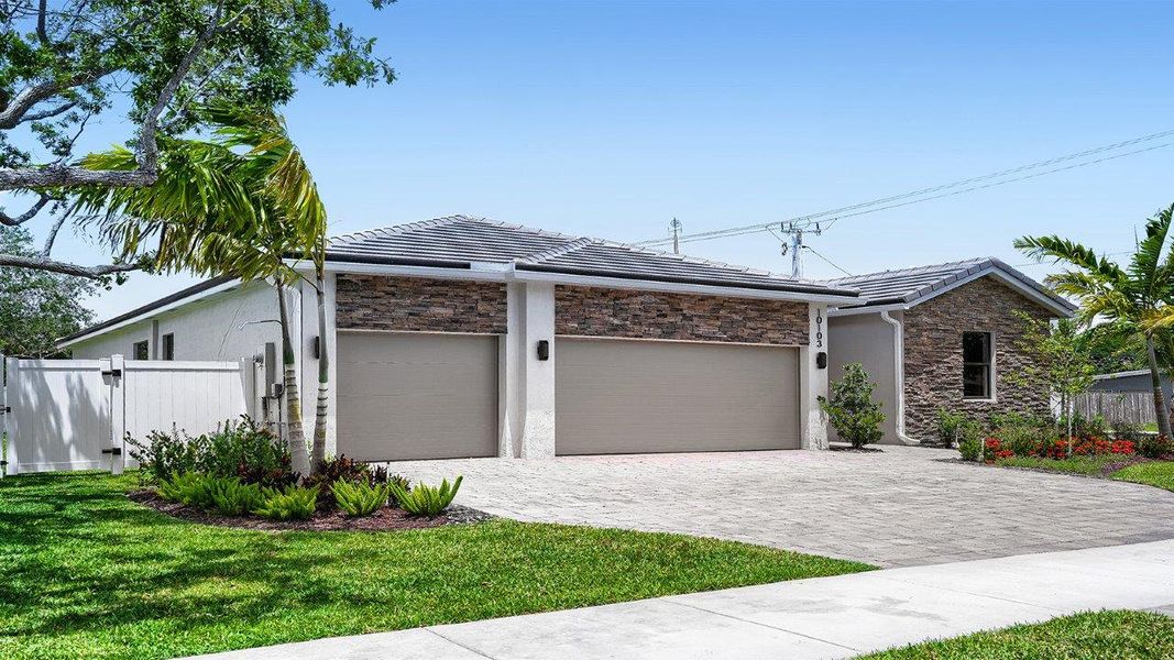 Representative exterior photo of a completed home built from the Destin by D.R. Horton in Capistrano, Cutler Bay, FL (Image 2). Representative exterior photo of a completed home built from the Destin by D.R. Horton in Capistrano, Cutler Bay, FL (Image 2).