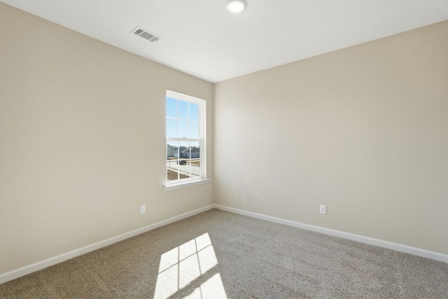 Representative unfurnished interior of a home built from the The Chatman by RTS Homes in The Gardens at 15 West, Hinesville (Image 40).
