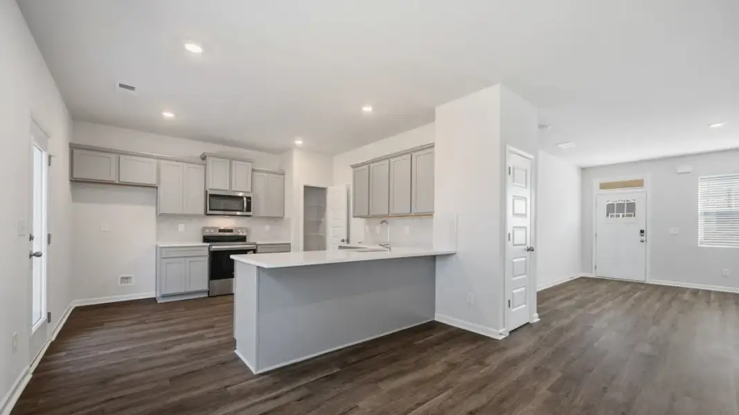 Representative furnished interior of a home built from the Brandon by D.R. Horton in Walden Ridge, Macon (Image 4).