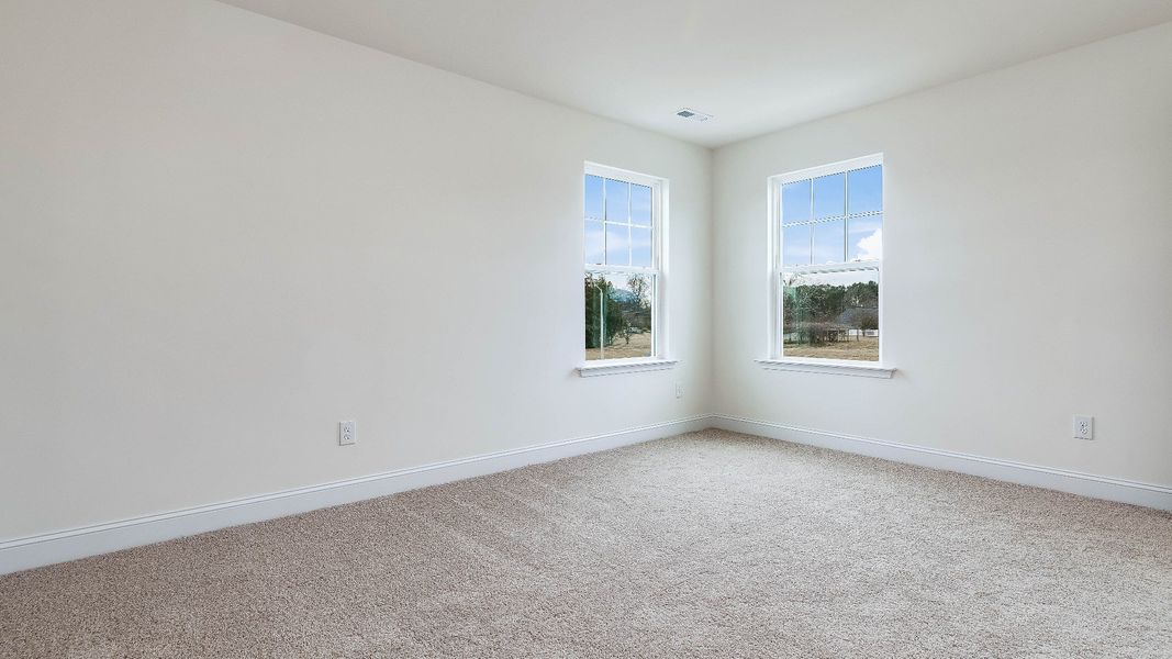 Furnished interior view inside a new home in Sidney Creek Single Family, Zebulon (Image 11).