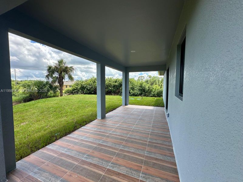 Exterior details and patio area of a home in , Lehigh Acres (Image 3). Exterior details and patio area of a home in , Lehigh Acres (Image 3).