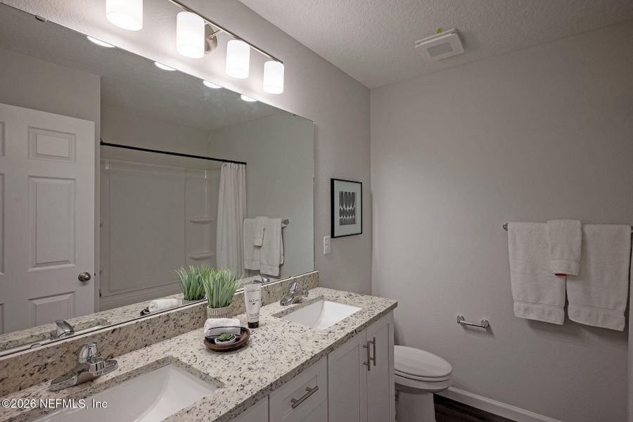 Furnished interior view inside a new home in , Jacksonville (Image 33). Furnished interior view inside a new home in , Jacksonville (Image 33).