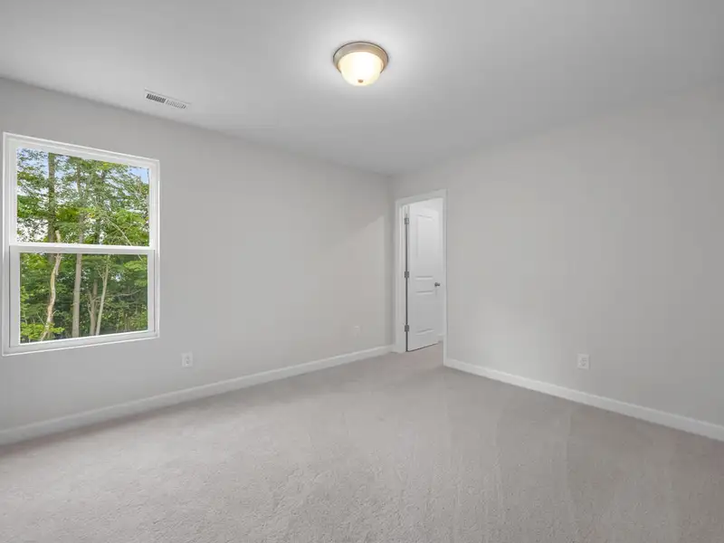Spacious, unfurnished interior of a new home in Wellers Knoll, Lillington (Image 21).