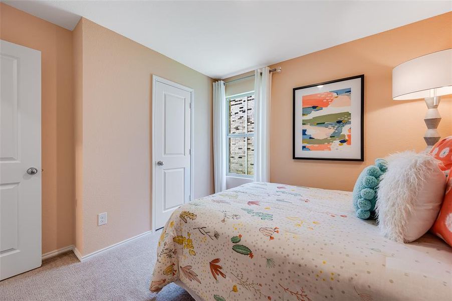 Bedroom featuring carpet flooring