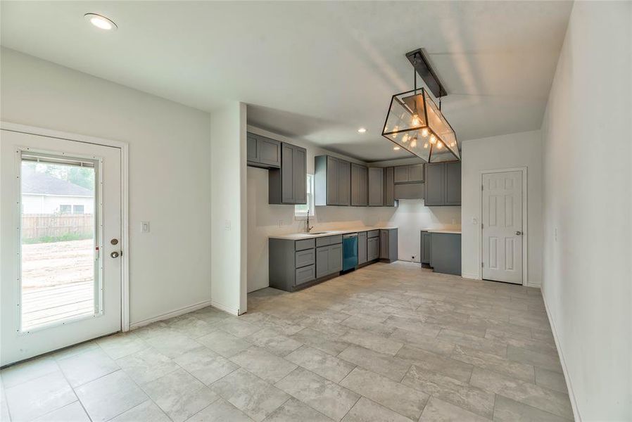 KITCHEN WITH QUARTZ COUNTERTOP,NEW RANGE AND DISHWASHER, 42 INCH CABINETS, LARGE FOOD PANTRY KITCHEN WITH QUARTZ COUNTERTOP,NEW RANGE AND DISHWASHER, 42 INCH CABINETS, LARGE FOOD PANTRY