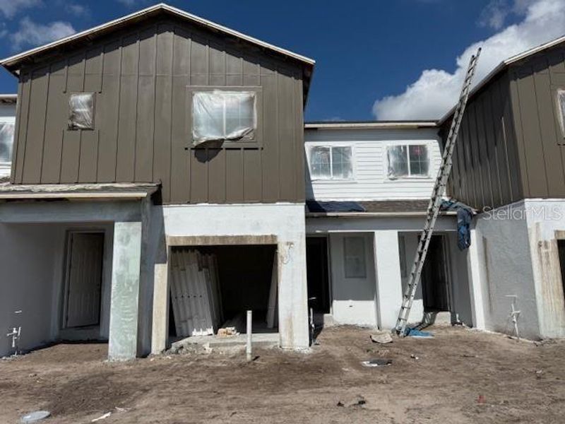In-progress construction of a new home in Tyson Ranch, Orlando, FL (Image 1).