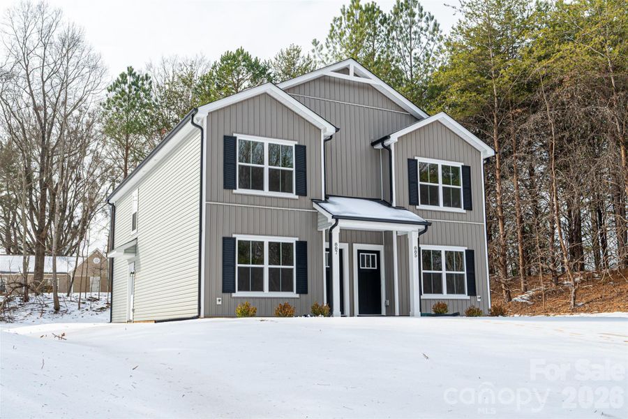 Front exterior of a new home in , Newton, NC, highlighting curb appeal (Image 13). Front exterior of a new home in , Newton, NC, highlighting curb appeal (Image 13).