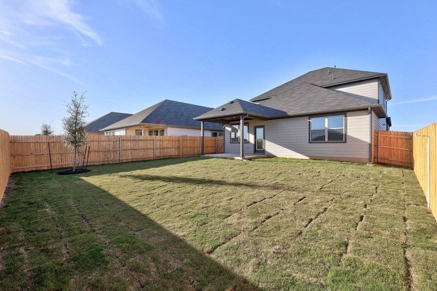 Exterior details and patio area of a home in Prairie Winds, Hutto (Image 3).