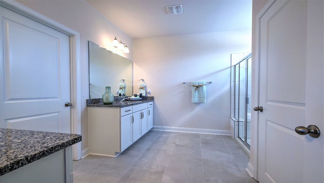 Furnished interior view inside a new home in Reserve at Tap Root Farms, Fletcher (Image 28).