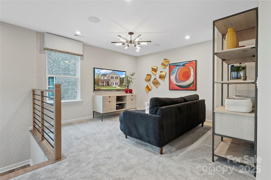 Secondary living space at the loft adds livability to the second floor.